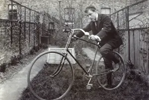 Privy Prints: Boy getting on to his new Bicycle