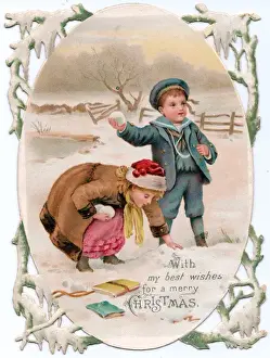 Boy and girl in the snow on a Christmas card