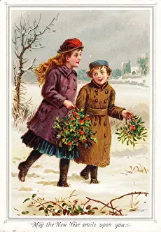 Boy and girl in the snow on a New Year card