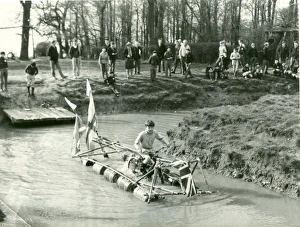 Images Dated 23rd January 2012: Boy operating pedal-driven drum raft