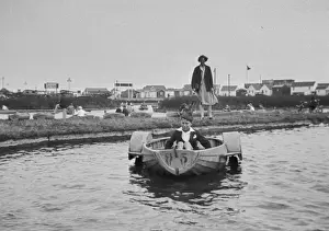 Pedal Prints: Boy in a pedalo boat
