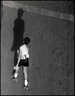 Boy on rollerskates, Spain