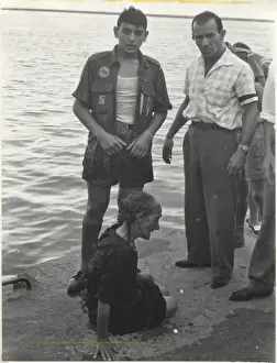 Fragile Prints: Boy scout saves drowning woman, Athens, Greece