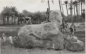 Boy scouts on an alabaster Sphinx, Egypt