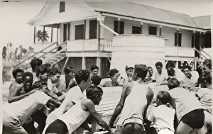 Bringing Prints: Boy scouts with raft at camp, British Honduras