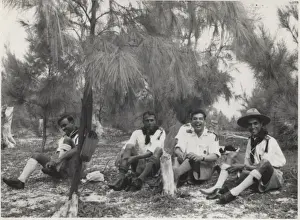 Boy scouts relaxing under a tree, Mauritius