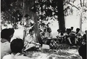Boy scouts relaxing under trees, Mauritius