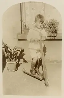 Scooter Prints: Boy on Toy Scooter