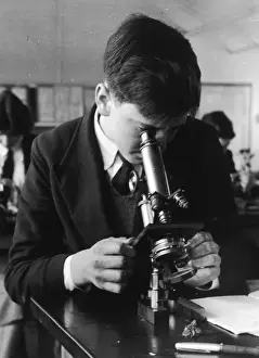 Boy Using Microscope
