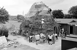 Boys build mountain at school, Seaford, East Sussex
