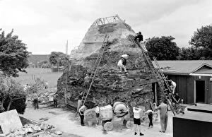 Images Dated 7th September 2015: Boys build mountain at school, Seaford, East Sussex