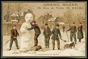 Boys Build Snowman