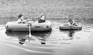 Ripples Prints: Two boys and a dog in rubber dinghies