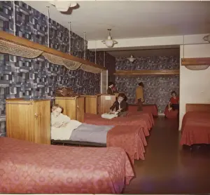 Boys in dormitory at Baden Powell House, London