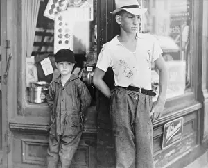 Boys in front of drugstore. Dover, Delaware