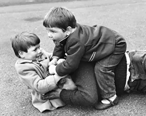 Struggling Prints: Three boys fighting, Balham, SW London