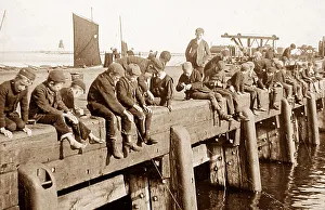 Crabs Prints: Boys fishing on a pier early 1900s