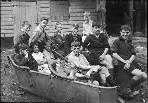 Dilapidated Prints: Twelve boys have fun in dilapidated car 1928