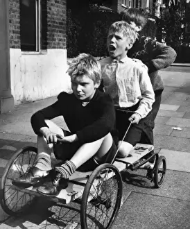 Urchins Prints: Boys on a go-kart in a Balham street, SW London