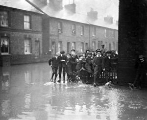 Images Dated 6th February 2012: Boys having fun during Medway floods, Kent