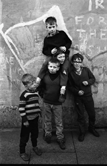 Images Dated 11th September 2015: Boys with IRA graffiti, Belfast, Northern Ireland