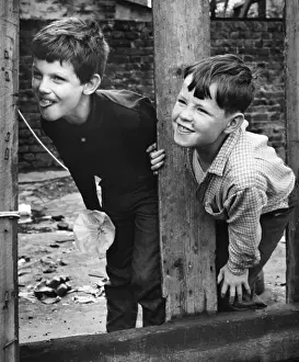 Rude Prints: Two boys playing on a Balham street, SW London