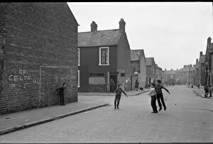 Images Dated 11th September 2015: Boys playing football, Belfast, Northern Ireland