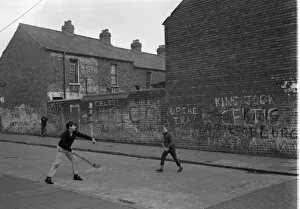 Images Dated 11th September 2015: Boys playing hurling, Belfast, Northern Ireland