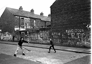 Images Dated 11th September 2015: Boys playing hurling, Belfast, Northern Ireland