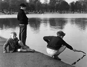 Images Dated 19th August 2015: Boys at Pond
