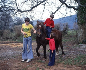 Images Dated 21st November 2016: Three boys with a pony, Exmoor