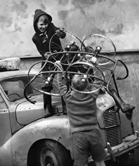 Chassis Prints: Boys with pram wheels and car in Balham street, SW London