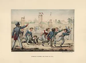 Boys running and climbing over an obstacle