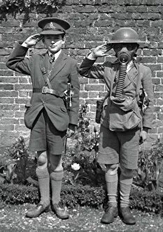 Two boys saluting