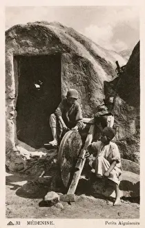 Grinders Prints: Two boys sharpening knives - Medenine, Tunisia, North Africa