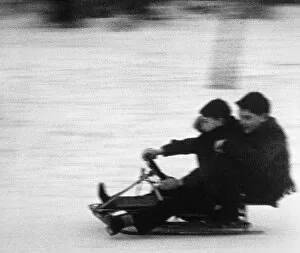 Images Dated 9th March 2012: Two Boys Sledging C1960