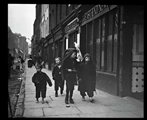Passing Collection: Four boys in a street in the East End of London