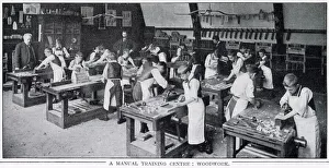 Images Dated 6th January 2021: Boys at workbenches learning how to use plane