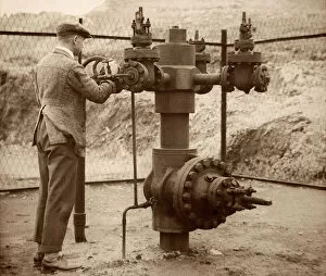Worker Collection: BP employee opening the flow valves