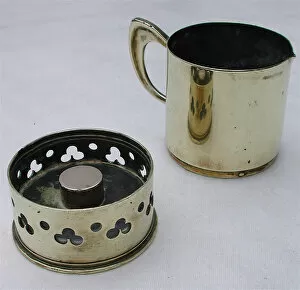 Images Dated 22nd July 2007: Brass jug made from 2 French 75 mm shell case bottoms