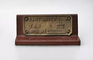 Images Dated 21st November 2011: Brass plate, on a wooden plinth- CART WATER TANK