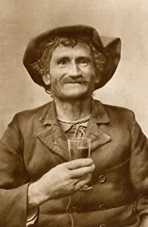 Bretagne Prints: Breton fisherman holding a drink, Brittany, Northern France