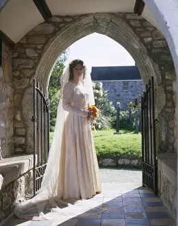 Images Dated 25th November 2016: Bride in church porch, Marazion, Cornwall