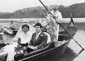 Bridegroom Gallery: Bride and groom in a gondola, Malpas, Cornwall