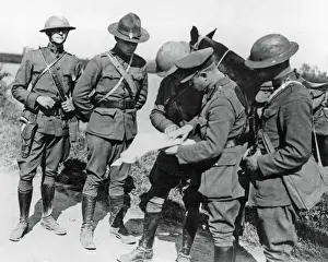 Consulting Prints: British and American soldiers with map, France, WW1