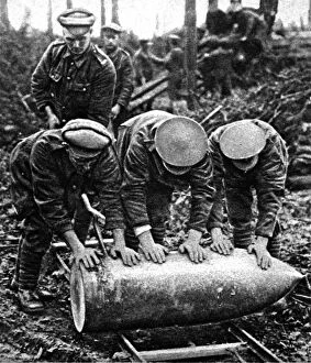 British Artillerymen with a large shell; First World War, 19