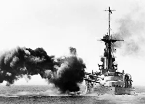 British battleship firing a broadside during WW1