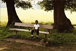 British Caribbean Heritage - Boy on the bench Hampstead Lond
