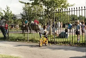 Mounting Prints: British Caribbean Heritage - Boy mounting his yellow bike