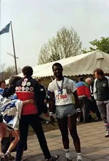 Runner Collection: British Caribbean marathon runner stand facing the camera
